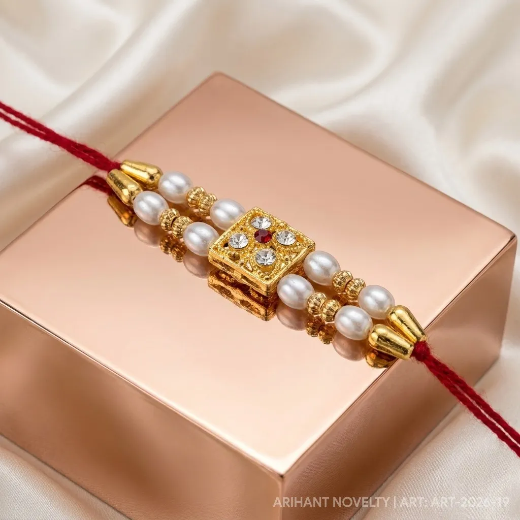 Ruby Dot White Pearl Rakhi – handmade Meenakari rakhi from Bikaner by Arihant Novelty